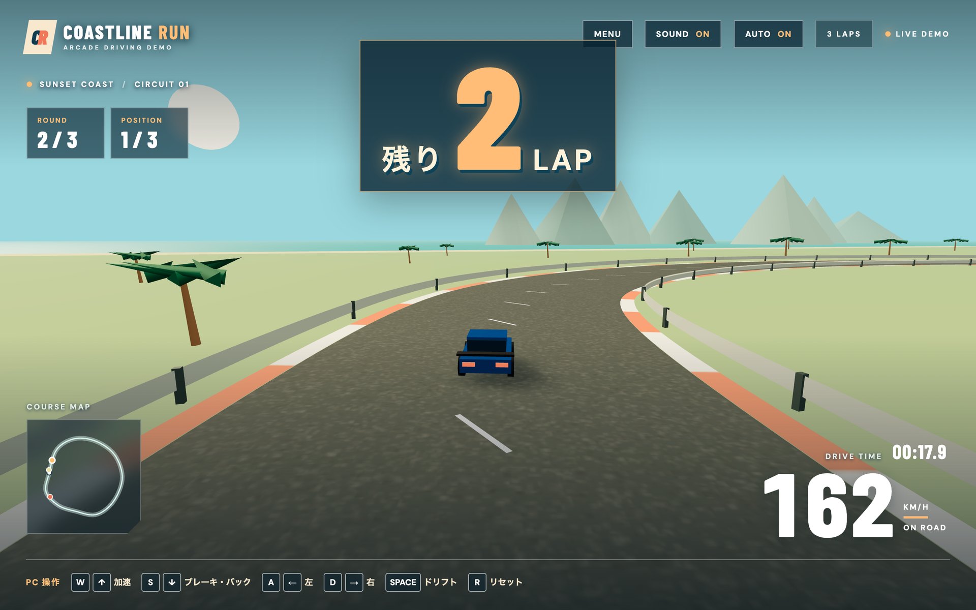 1周目を終えた直後の画面。画面の上部に「残り 2 LAP」という大きな表示が出ており、手前の車とは重なっていない